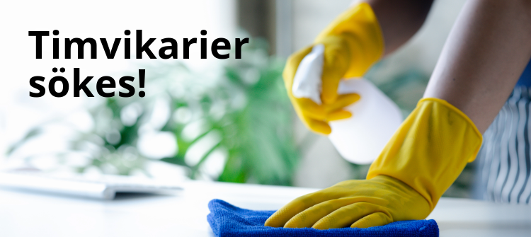 "Timvikarier sökes!" En hand i gula handskar torkar en yta med en blå trasa.